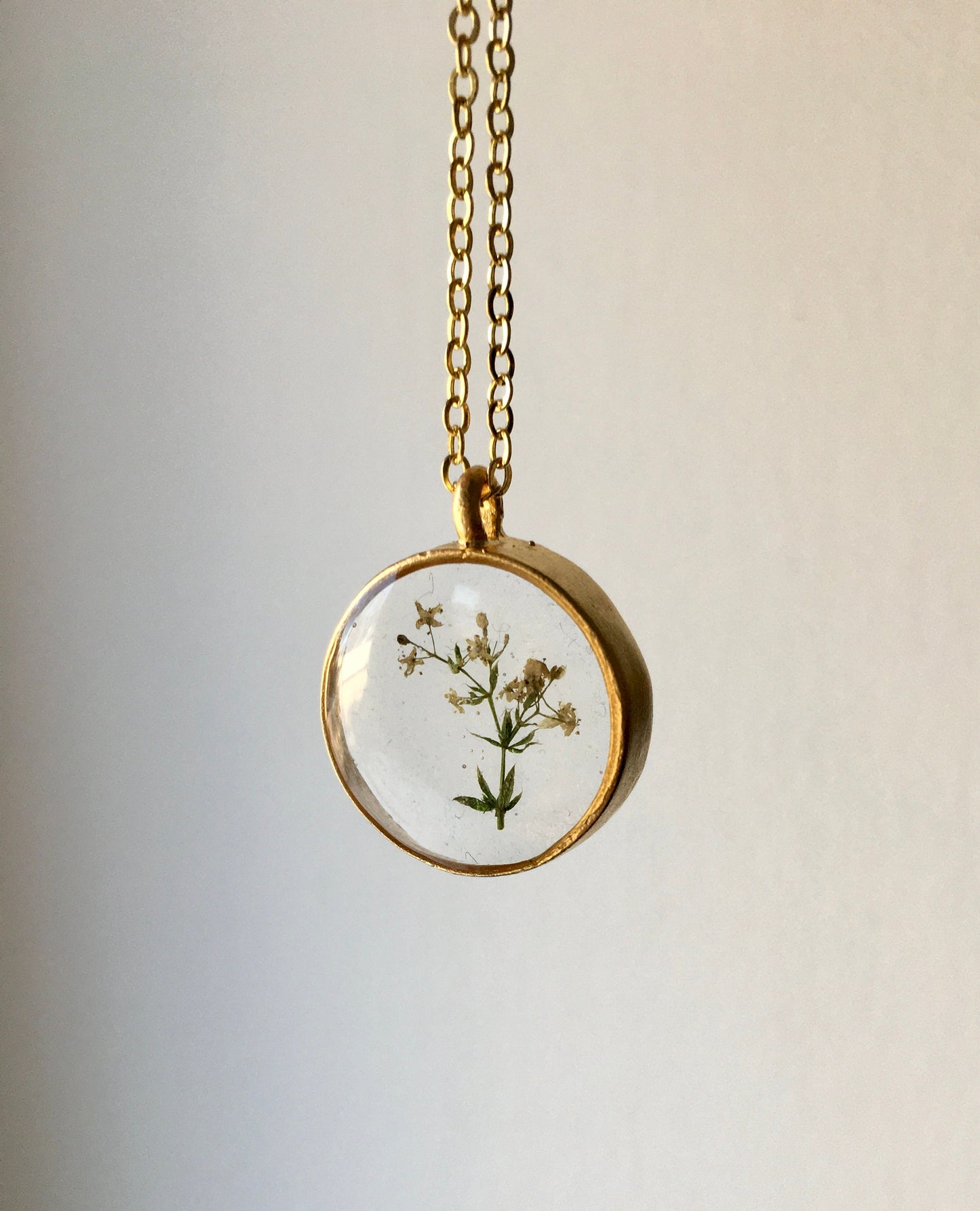 Necklace with delicate flowers of snarlweed