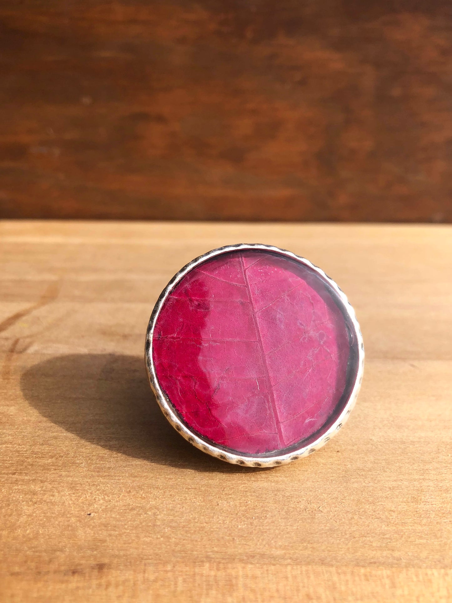 Large ring with intense red leaves