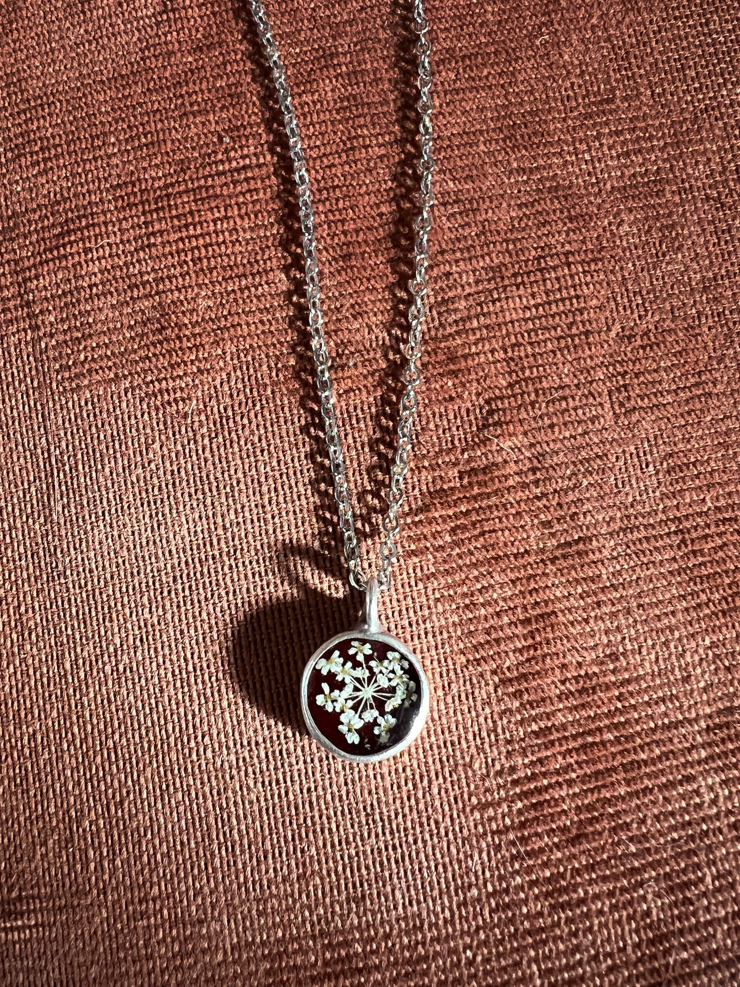 Burgundy necklace with pressed Queen Anne's Lace